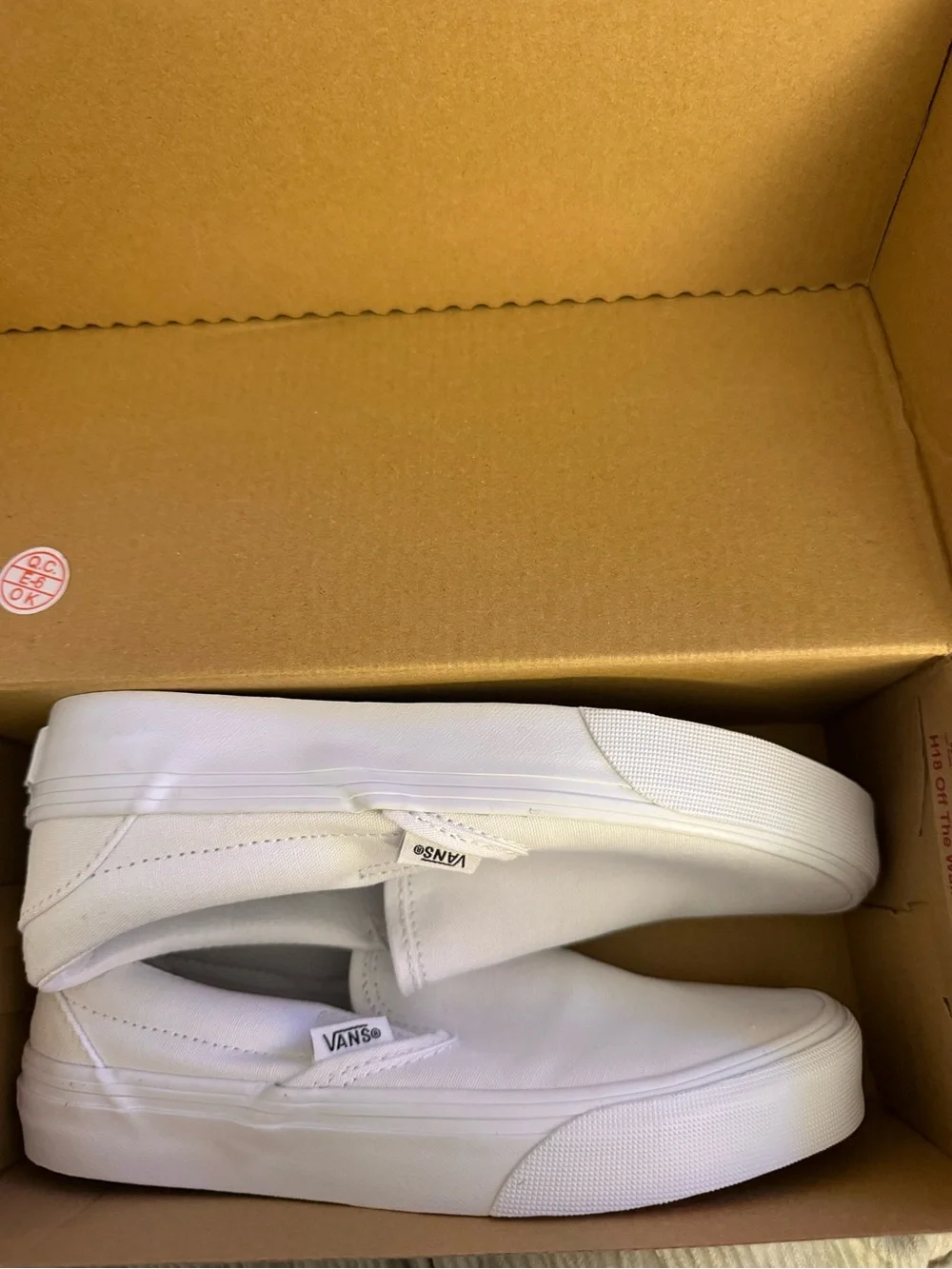 Vans White Classic Slip-On Canvas Sneakers